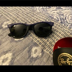 Purple and black wayfarer rayban sunglasses. Comes with case and lens wipe.
